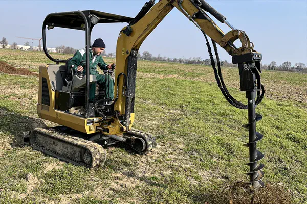 Mini excavator drill