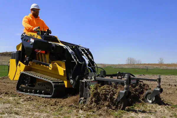 Mini skid steer loader used in Agriculture